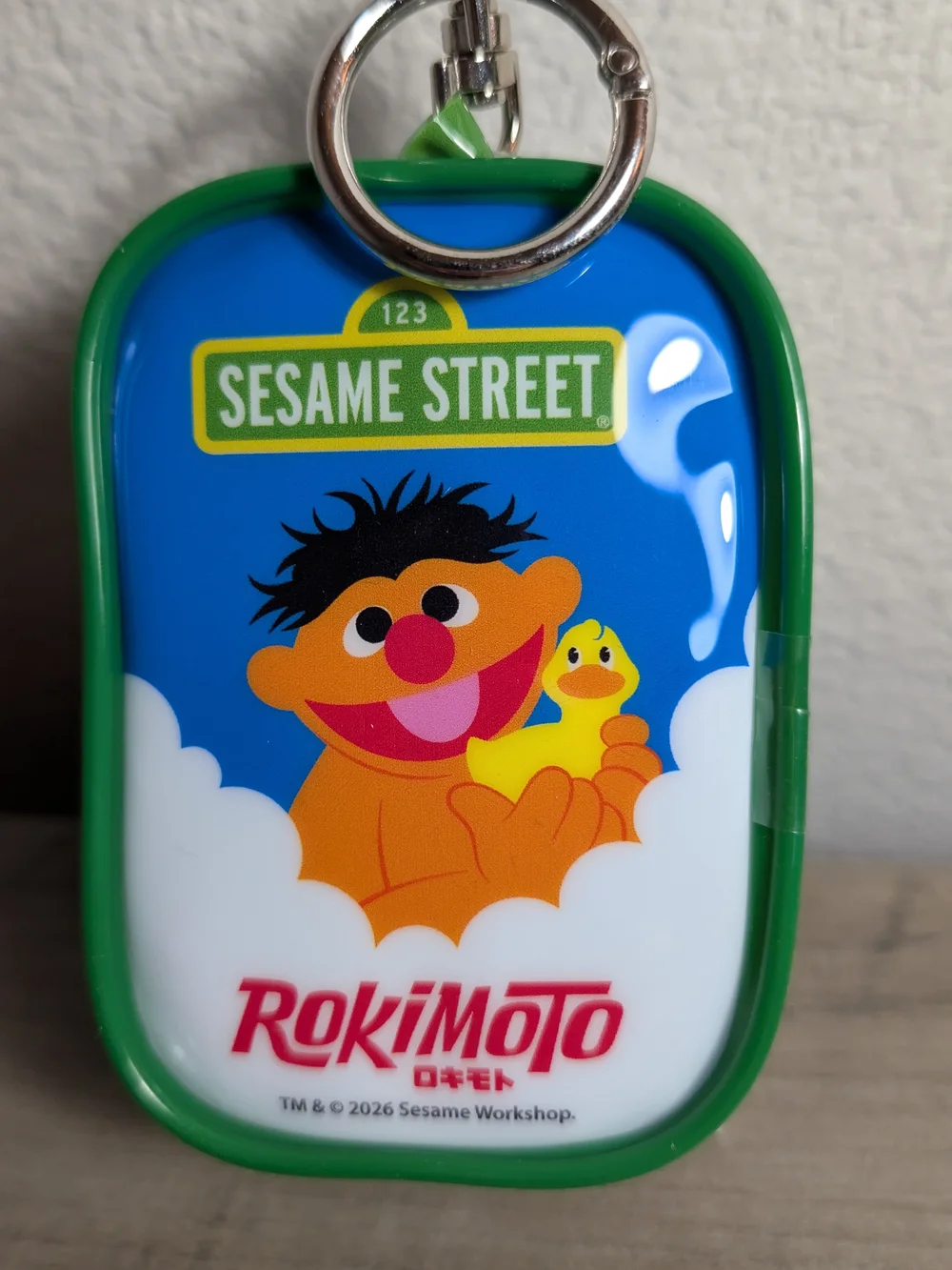 Sesame Street Ernie Bath Toy Pouch with Red-Nosed Figure and Green Trim